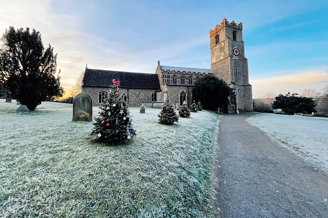 St Mary's Church Coddenham with Christmas tree in frost