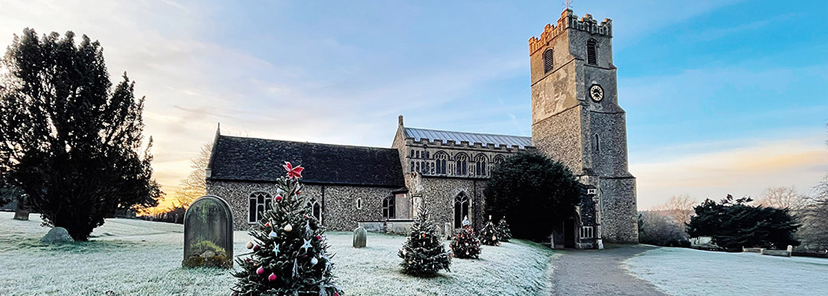 St Mary's Church Coddenham with Christmas tree in frost